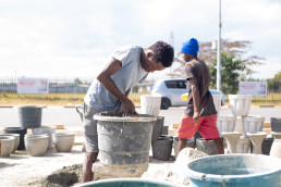Artisans from Kamloops Cooperative in Lusaka, Zambia using quarry dust to make decorative items