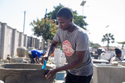 Artisans from Kamloops Cooperative in Lusaka, Zambia using quarry dust to make decorative items