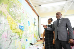 Commissioner and Deputy Commissioner of Mines, Mr. Roy Nicholson and Ms. Stacy Plummer, discussing plans for development of a digital mining cadastre