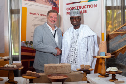 Ibrahim Djagra, Cameroonian social entrepreneur/ ADJEC, and Martin Hart-Hansen, UNDP Cameroon Deputy Resident Representative at the construction materials stall