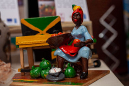 Products made with Development Minerals by Jamaican entrepreneurs and artisans showcased at the exhibition. Products made clay show scenes of everyday life in Jamaica and are marketed to tourists.