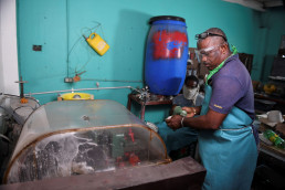 At the workshop of Artisan House, an enterprise making art from development minerals and recycled glass