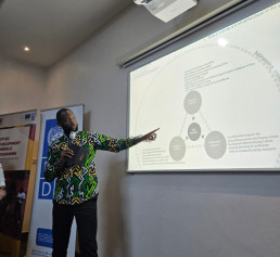 Mkhululi N. Ncube, Programme Management Officer at the African Minerals Development Centre, addressing participants during a plenary session.
