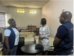 Mission team with the proprietor of Simonent Limited, one of the small-scale enterprises based in Kitwe, Copperbelt Province