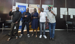 Participants from one of the working groups, captured after completing their collaborative work on the draft handbook.