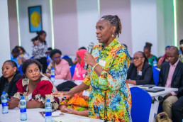 A participant representing the Tanga region makes a contribution during a workshop