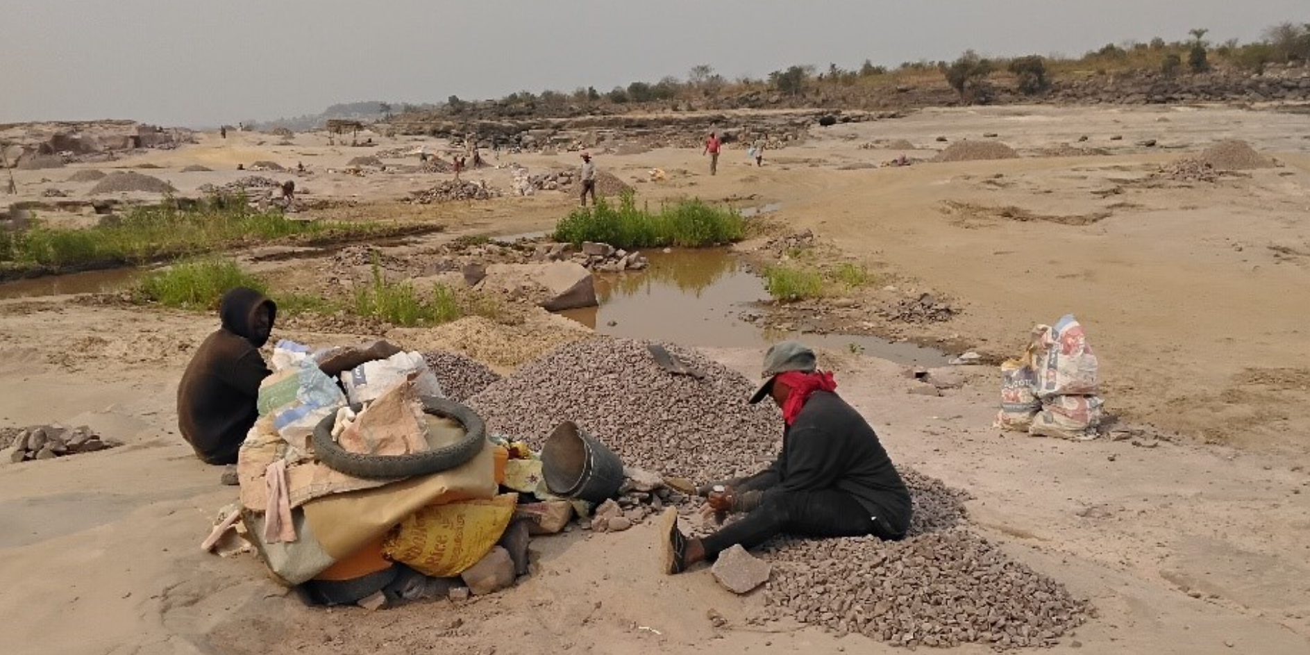 Women crush sandstone at the Kombe quarry site in Brazzaville. Located along the banks of the Congo River, Kombe is the city&acirc;s main hub for stone quarrying.
