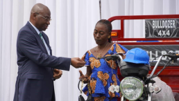 Mr. Michel Kouka-Mapengo, Chief of Staff for Mining, representing the Minister of State, Minister of Mining and Geology, hands out individual protective equipment to programme beneficiaries.