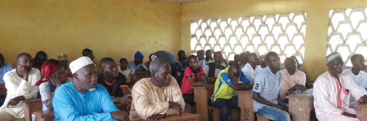 Community members in Batouri discuss findings from the assessment of environmental degradation and options for restoring areas affected by mining. The community-led approach involves local people directly in planning restoration efforts.